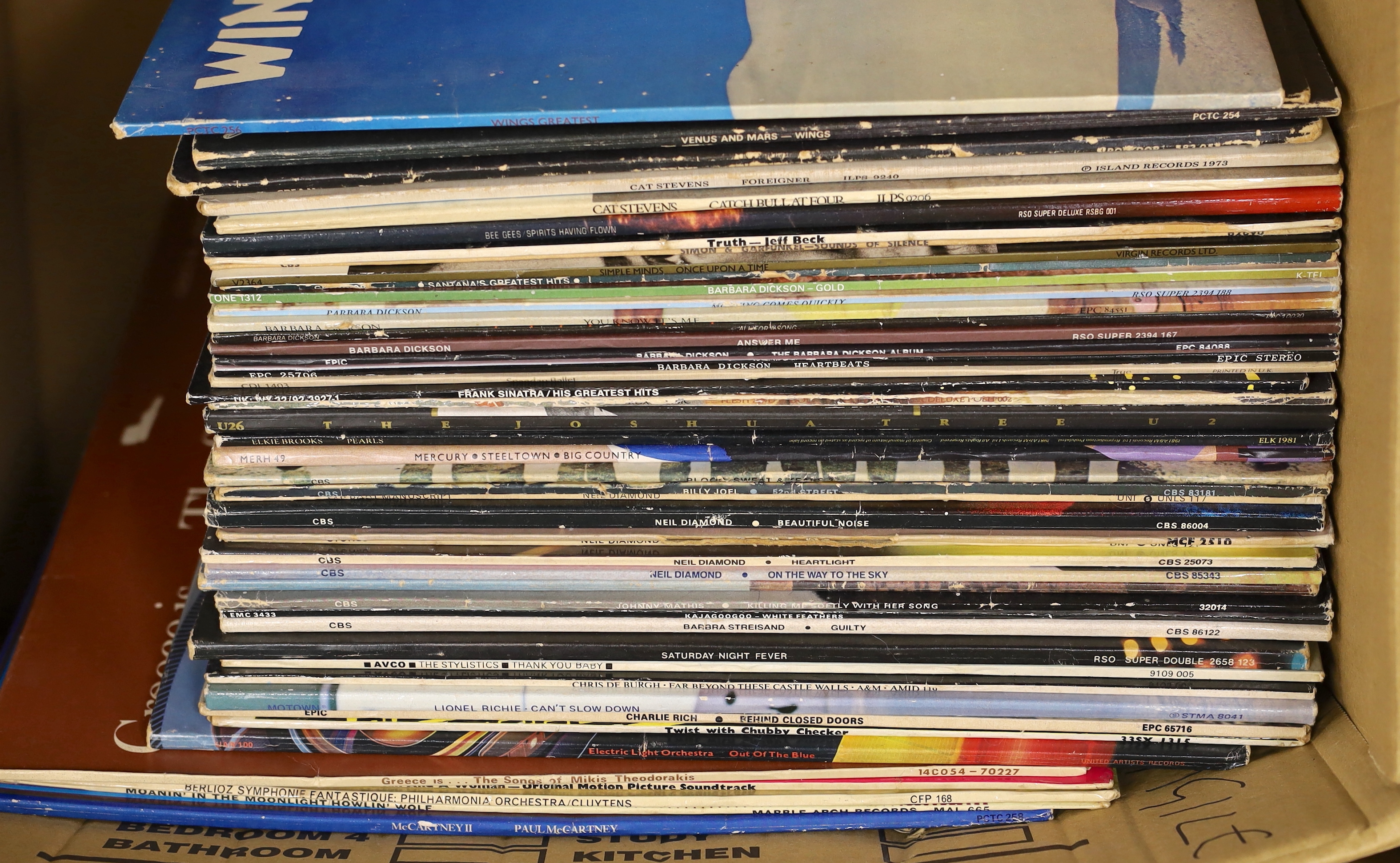 Ninety-five mainly 1970's and 80's LPs including Paul McCartney, Cream, Jeff Beck, Santana, U2, Neil Diamond, ELO, 10cc, Queen, Billy Joel, Elton John, Bob Dylan, The Spencer Davis Group, etc. Plus a quantity of 7 inch s